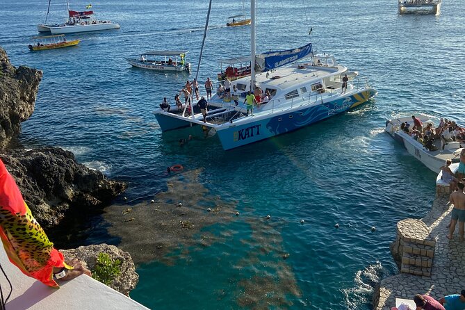4 Hours Party Boat Catamaran Cruise in Negril - Boarding the party catamaran