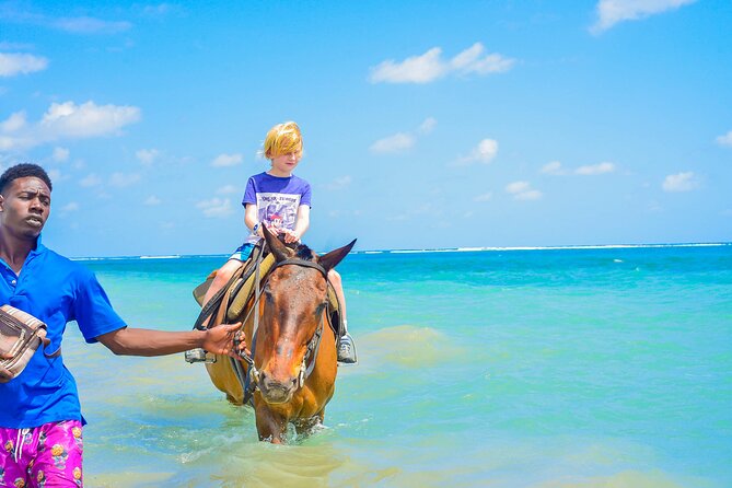 Aqua Fun Tours Dunns Falls, River Tubing and Horse Back - Climbing Dunn’s River Falls