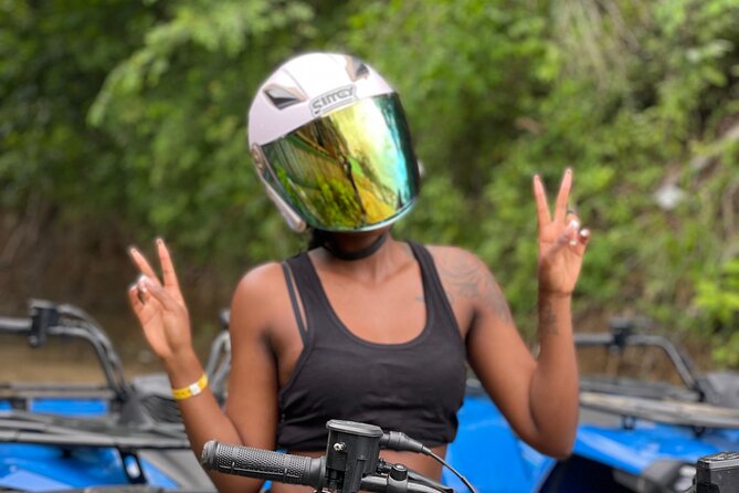 ATV and Bamboo Rafting with Transport from Montego Bay - Bamboo rafting downstream with a local captain