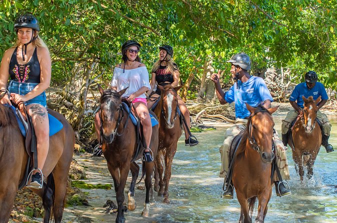 ATV, Horseback Ride, Zipline, Falls Climb + Lunch from Ocho Rios - Ziplining above Dunn’s River Falls