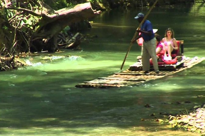 Authentic Jamaican Bamboo Rafting Tour from Montego Bay - What the guide adds to the river ride
