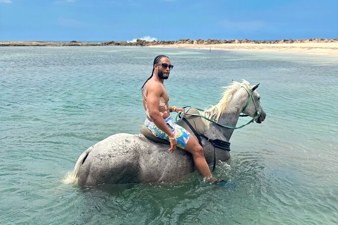 Bamboo Rafting & Horseback Ride n Swim Guided Tour In Montego Bay - From Montego Bay to the Martha Brae River