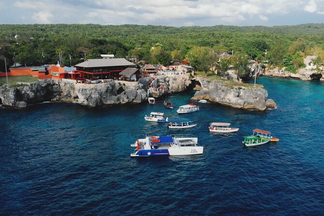 Bamboo River Rafting with Negril Ricks Cafe Visit - Margaritaville on Negril’s Seven-Mile Beach