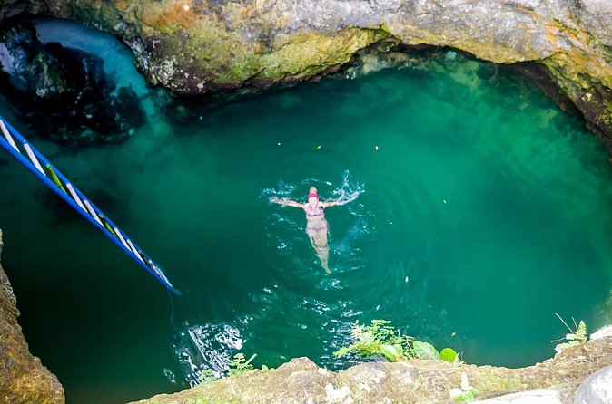 Blue Hole Mineral Spring, Ricks Cafe, 7 Mile Beach and Shopping Private Tour - Time Square Mall: a practical shopping break