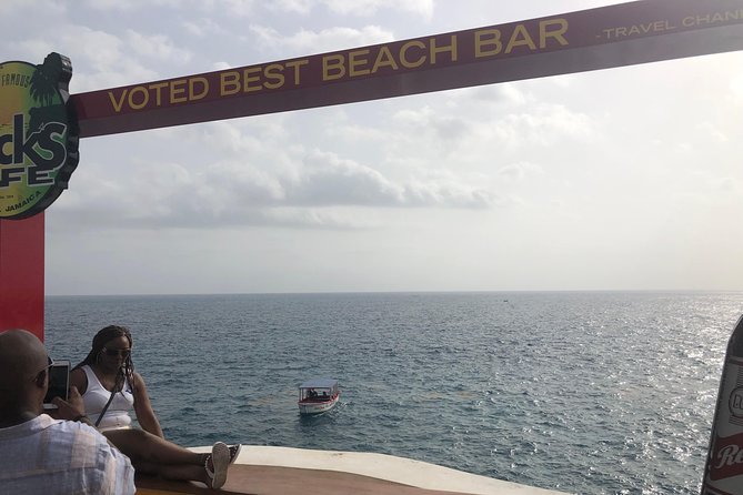 Blue Hole Mineral Springs, Rick's Café, and Shopping Combo Tour - Negril shopping, with time to choose your own souvenirs