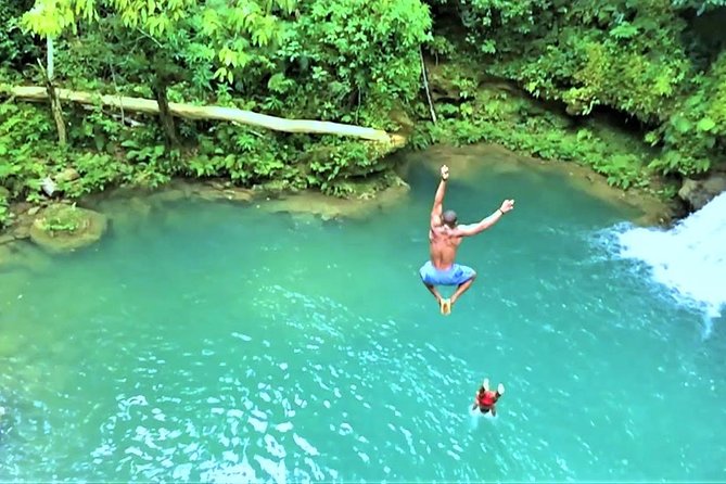 Blue Hole plus Secret Falls and Dunns River Falls Combo from Runaway Bay Hotels - Climbing Dunn’s River Falls from the beach