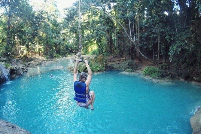 Blue Hole Secret Falls and River Tubing Tour - Private transportation makes the long day easier