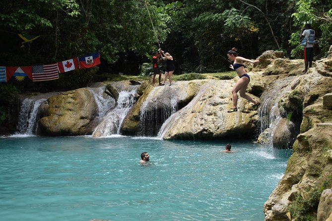 Blue Hole & Secret Falls Day Trip plus Shopping from Runaway Bay - Cool Blue Hole: rope swings and cold mountain water