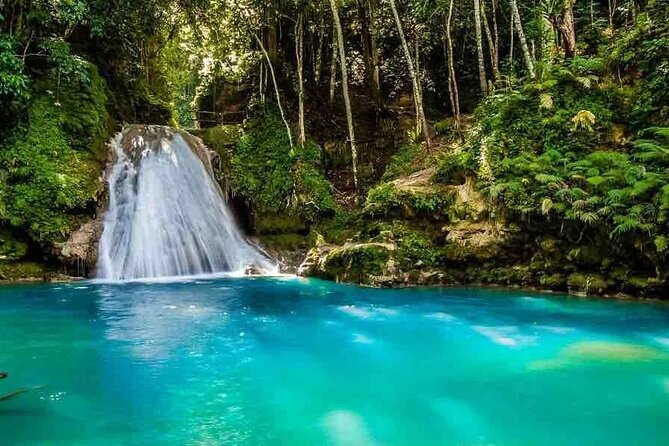 Blue Hole, Secret Falls & River Rapids Tubing from Montego Bay - White River tubing starts gently