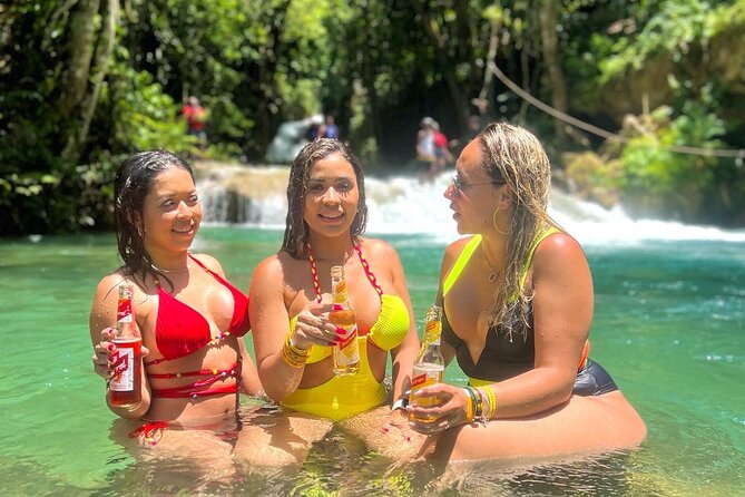 Blue Hole Secret Falls, White River Rafting, and River Tubing from Ocho Rios - Rope swings and cascades add more than scenery