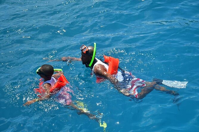 Boatride & Snorkeling then Margaritaville Hipstrip Activity - Boarding the boat and getting ready to snorkel