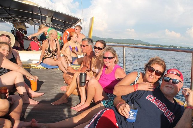 Catamaran Cruise Full Day Tour to Reef, Caves and Negril Beach - Reggae, open bar, and the floating party