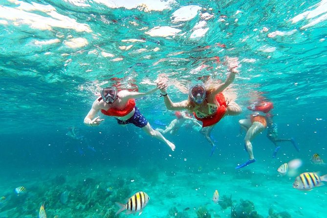 Catamaran Cruise Full Day Tour to Reef, Caves and Negril Beach - Sunset on Negril’s west coast