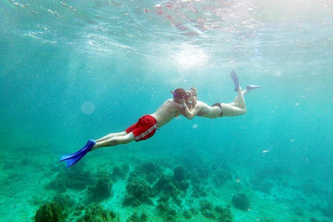 Catamaran Cruise Full Day Tour to Reef, Caves and Negril Beach - Leaving Ocho Rios by bus