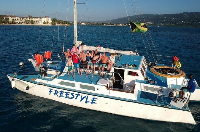 Catamaran, snorkeling & Dunn's River Falls - Catamaran cruising with drinks and music