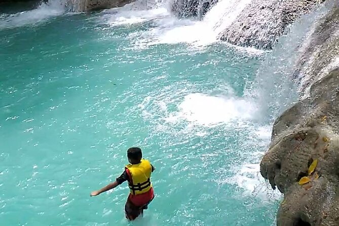 Dunns River Falls & Blue Hole Combo from Montego Bay with Pick Up - Lunch at a local Jamaican jerk centre