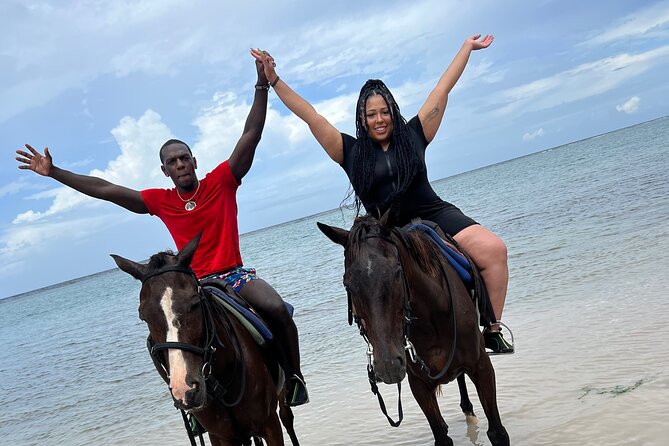 Dunns River Falls, Rafting, Zipline & Horseback from Montego Bay - Bamboo rafting on the White River