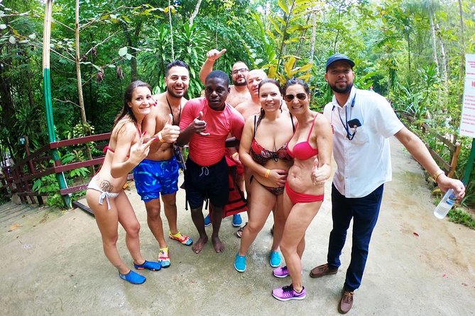 "Explore Scenic Tropical Waterfalls at Blue Hole" - Climbing rocks and jumping from marked points
