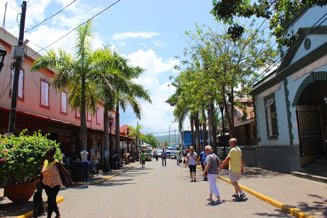 Falmouth Shopping and Lunch Tour - Jamaican crafts beside diamonds and watches
