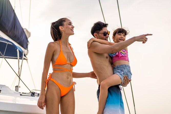 Family Catamaran Cruise from Jamwest Beach Negril Hotels - One hour at Rick’s Cafe