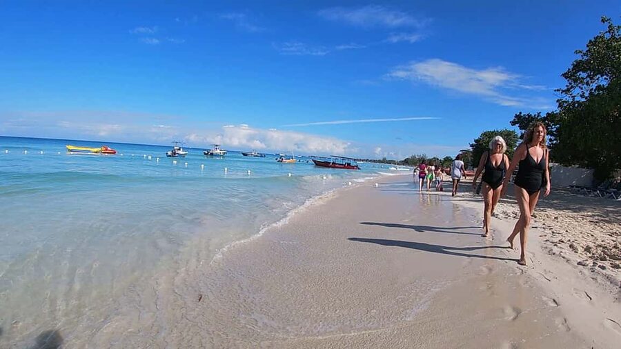 From Montego Bay: Negril Beach & Rick's Cafe Sunset Day Trip - Seven Mile Beach: Jamaica’s easy postcard moment