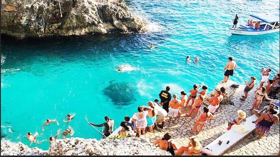 From Montego Bay: Negril Day Trip and Rick's Café Sunset - Seven Mile Beach: beautiful, popular, and worth clarifying