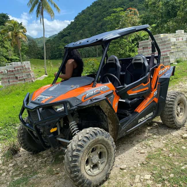 From Montego Bay/Negril: RastaSafari UTV Experience - Getting set up with a drink and local plants