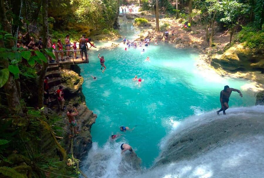 From Runaway Bay: Island Gully Falls and Blue Hole Tour - Arriving at Island Gully Falls and the Blue Hole