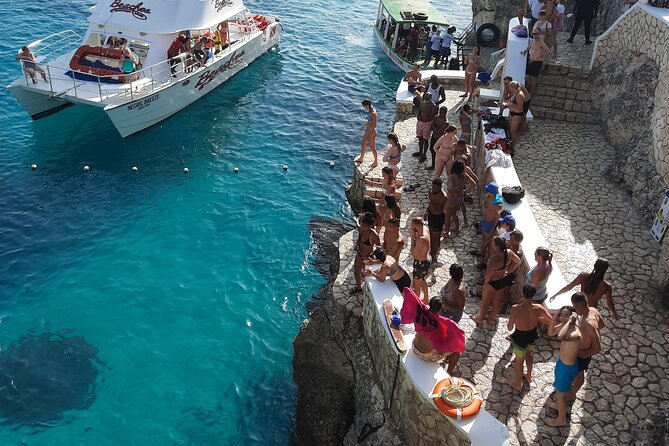 Full Day ATV, Ricks Café, Beach and Shopping Tour from Montego Bay - Rick’s Cafe closes the day with cliff-jump spectacle