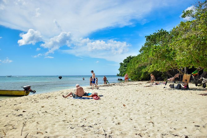 Glass Bottom Boat Ride/Snorkeling/Booby Cay Island from Negril - Booby Cay Island, white sand, and a small grill