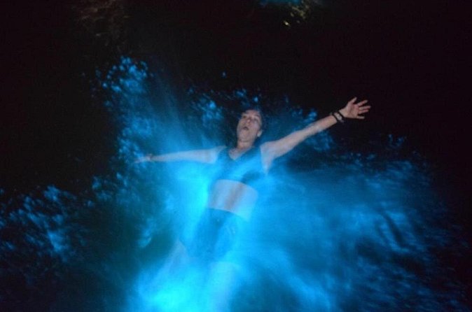 Glow with the Flow: A Romantic Night at the Luminous Lagoon”) - Boarding the boat at Luminous Lagoon