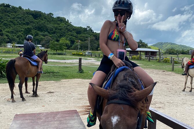 Great River Rafting Limestone Foot Massage and Horseback Rides From Montego Bay - Riding a horse into the Caribbean Sea