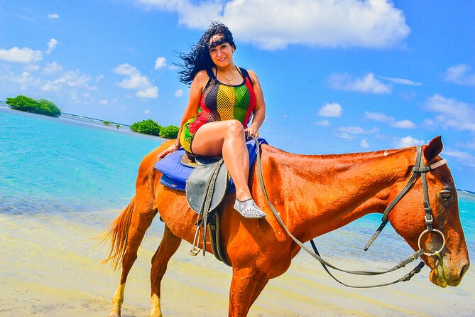Horseback Ride and Swim Experience Montego with Transportation - Getting settled with a calm, trained horse