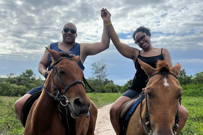 Horseback Ride and Swim Experience Montego with Transportation - Entering the water with your horse