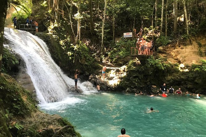 Horseback Ride, Blue Hole, Secret Falls, River Rafting & Tubing - White River tubing through the rainforest