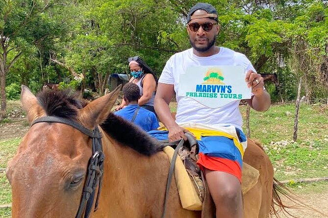 Horseback Riding in the ocean & Bamboo Rafting from Ocho Rios - Riding the White River by bamboo raft