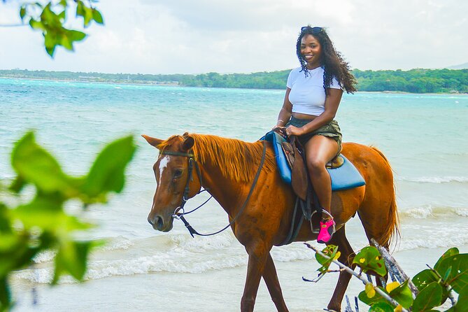 Jamaica's Ocean Horseback Bamboo Raft Adventure and Transport - A four-hour Jamaican outing with two very different moods