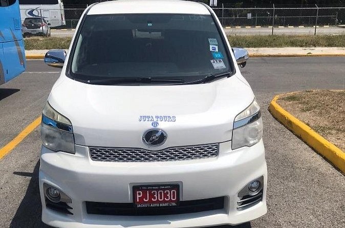 Montego Bay Airport Taxi to Princess Grand Jamaica Green Island - Leaving Sangster Airport with a named pickup
