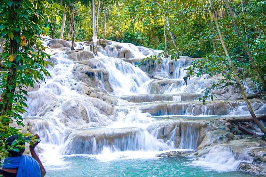 Montego Bay: Blue Hole, Dunn’s River, and Beach Club Trip - Guides and Transport Shape the Day