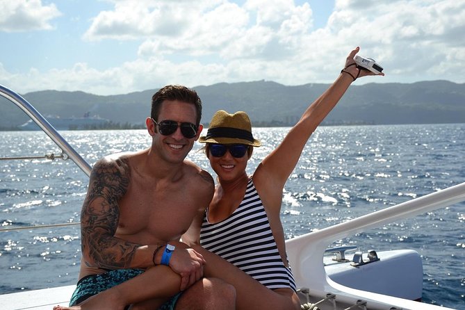 Montego Bay Catamaran Cruise and Snorkeling Tour from Falmouth - Boarding the catamaran with reggae and rum punch