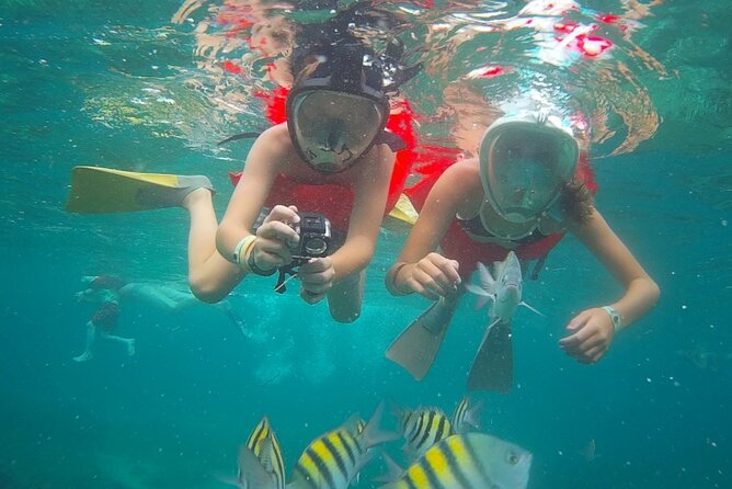 Montego Bay Catamaran: Snorkel Tour with Open Bar & Reggae DJ - The complimentary foot massage and small extras