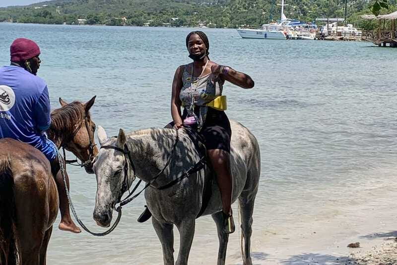 Montego Bay: Day Trip with Zipline, ATV, and Horseback Ride - Riding a horse from dry land into the sea