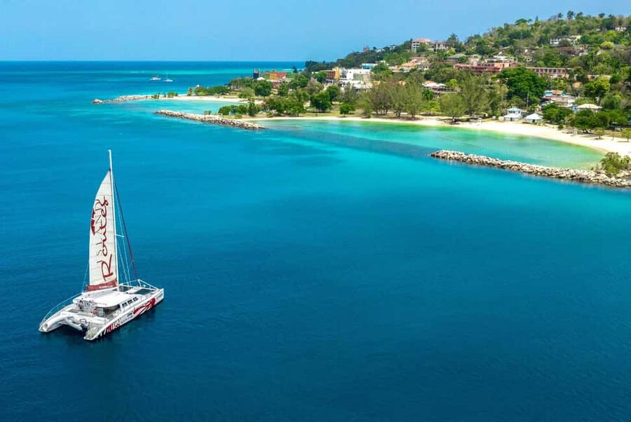 Montego Bay: Reggae Catamaran 18+ Cruise with Open Bar - Montego Bay coastline from the water