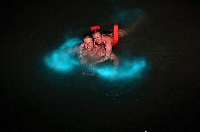 Mystic Luminescent Lagoon Night Cruise & Swim in Jamaica - The fire show and the wait between boats