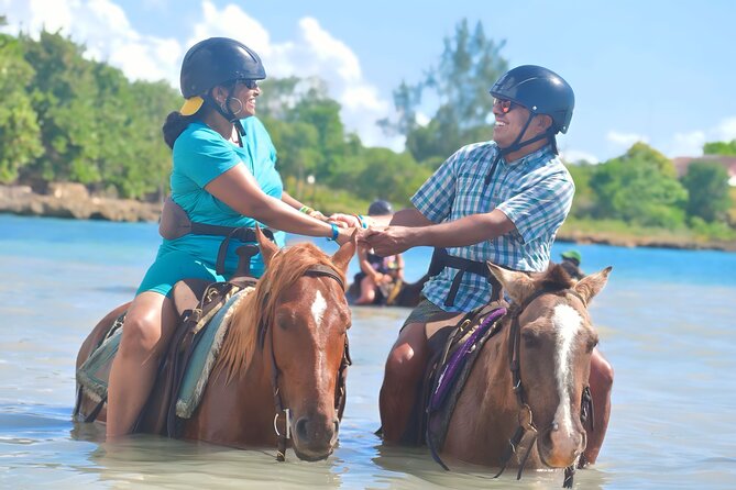 Negril 45-minute Guided Horseback Ride and Swim - Entering the Caribbean Sea on horseback