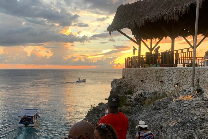 Negril 7 mile Beach, Party Catamaran Cruise , Snorkeling and Ricks Cafe Combo - Sunset and cliff jumping at Rick’s Cafe