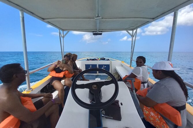 Negril Glass Bottom Boat Tour Snorkeling and Booby Cay - Group size, timing, and comfort