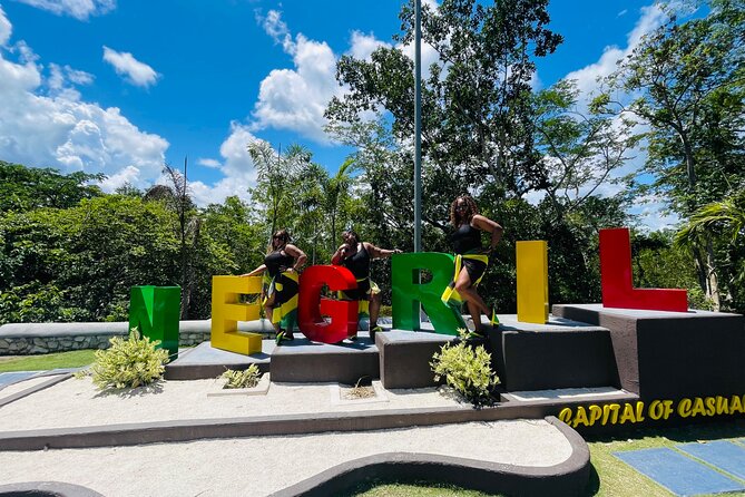 Negril Glass Bottom Boat Tour+Snorkeling visit Booby cay island - Seven Mile Beach and the ride to Picnic Island