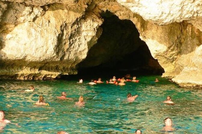 Negril PRIVATE CHARTER Catamaran (rate for 21 persons) - Rick’s Café adds cliff jumping, music, and sunset views