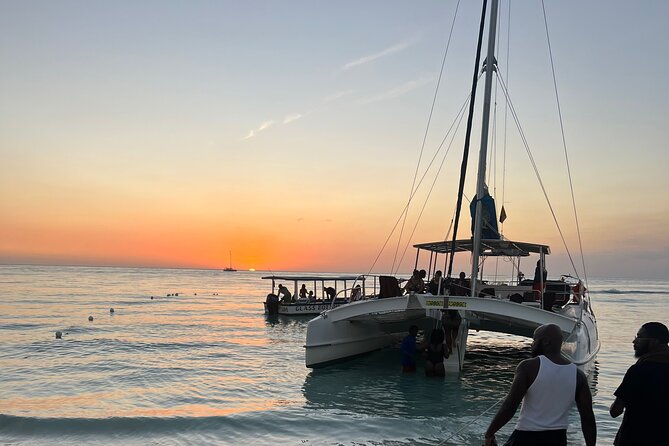 Negril Private Day Tour: ATV Ride, Party Catamaran & Ricks Cafe - Arriving at Rick’s Cafe by boat